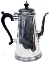 A silver coffee pot of tapered design with Bakelite handle and knop to hinged lid - London 1968