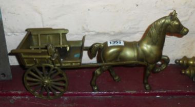 A cast brass horse and cart figurine