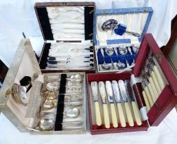 A box containing a quantity of cased silver plated cutlery and a bell