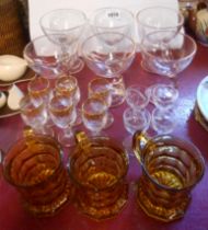 A quantity of assorted glassware including amber pressed tankards, set of six Italian champagne