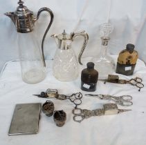 A box containing a quantity of silver plated items including two claret jugs, grape scissors and two