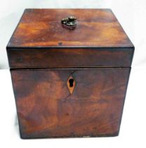 An antique satin mahogany single tea caddy of square lift-top form, with brass ring handle and