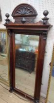 A late Victorian stained oak framed wall mirror with ornate pediment and oblong plate - 1.62m X