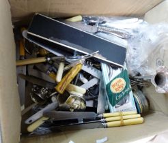 A box containing a quantity of silver plated items including cutlery, trumpet vase, etc.