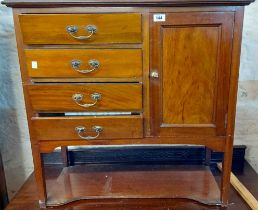 An 81cm vintage mahogany music cabinet with four fall-front drawers and panelled cupboard door,