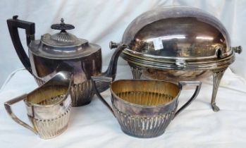 A silver plated roll-top breakfast dish - sold with a Walker & Hall plated three piece tea set of