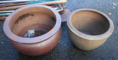 A large bulbous stoneware plant pot - sold with another similar