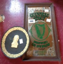 A vintage Guinness advertising mirror - sold with a Wedgwood black Jasperware 225th anniversary