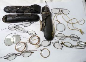 A bag containing a large quantity antique pince-nez and other spectacles