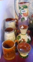 A quantity of Torquay pottery items including vases, jugs, etc. - various makers including Royal