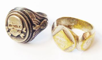 Two Second World War period rings, one incised 'Oran (Algeria) Africa 1943', the other a Waffen