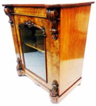 A 78cm Victorian walnut pier cabinet with flanking decorative carved capitals and shelves enclosed