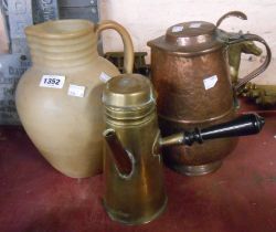 An Arts and Crafts movement beaten copper lidded jug with lift-top lid - sold with an antique