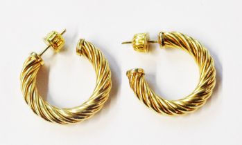 A pair of Cetas marked 585 yellow metal rope twist hoop earrings