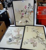 Three framed and glazed Oriental silk pictures