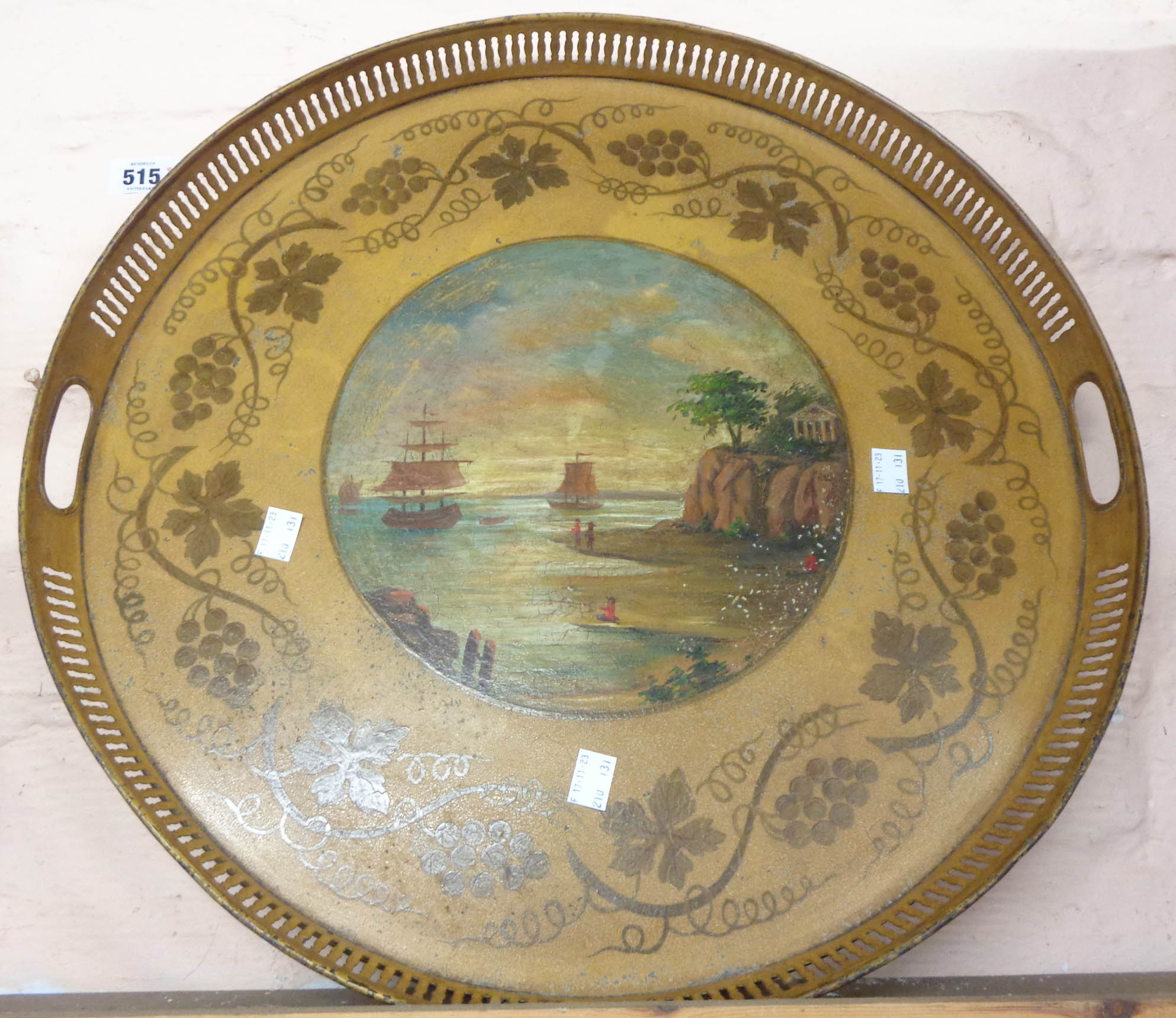 A 19th Century Toleware circular tray with pierced gallery, a central painted panel depicting - Image 2 of 2