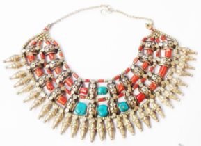 A marked 925 ornate Egyptian style dentil necklace, set with natural turquoise and red coral