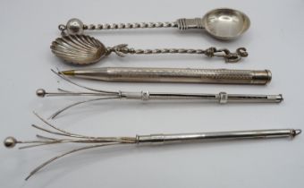 A silver 'Yard-o-Lead' mechanical pencil, two swizzle sticks and two decorative spoons