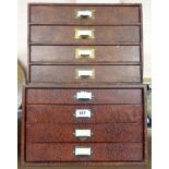 Two sets of vintage stationery drawers with paper covered finish and brass handles
