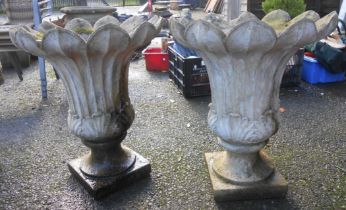 A pair of large decorative pedestal planters of tapered urn form - cracks
