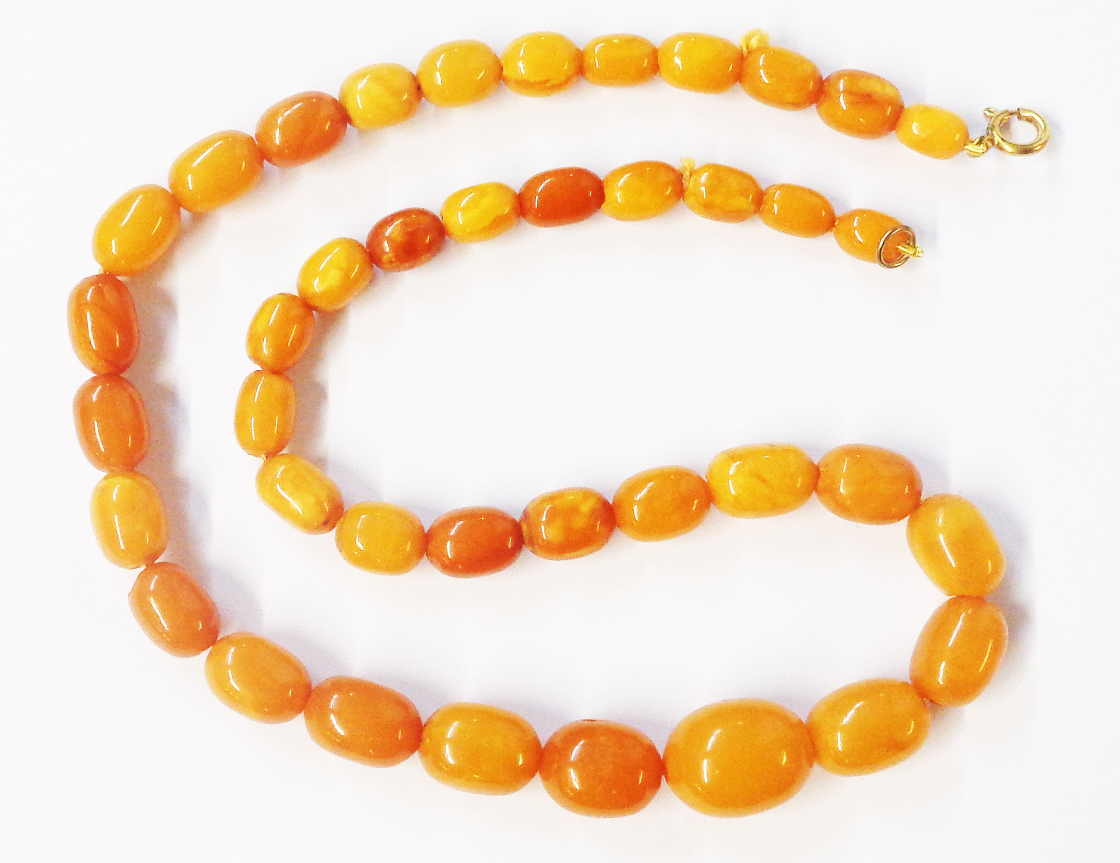 A butterscotch/honey amber graduated bead necklace