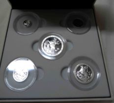 A boxed set of five encapsulated coins, The Forever the First Silver Sovereign Set