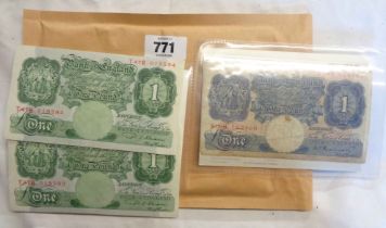 Three old GB banknotes comprising two 1940's consecutive green £1 (cashier Beale) and a blue £1 (