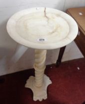 A white marble jardiniere stand with dished top (cracked), set on a rope twist pedestal with trefoil
