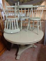 A 1.3m diameter antique tilt-top breakfast table - sold with a harlequin set of four standard chairs