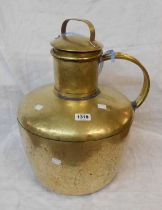 A large old North African brass lidded water jug