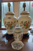 A pair of Coalport bone china table lamps, decorated in the Ming Rose pattern, set on hardwood