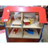 A modern wooden doll's house of open form with painted furniture, figures, etc.