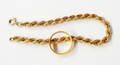 A 22ct. gold wedding band - size M 1/2 - sold with a 9ct. gold rope-twist bracelet