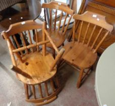 A set of six modern pine Windsor style stick back standard chairs