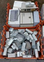 Two crates containing a quantity of electrical fittings including fuse boxes, etc.