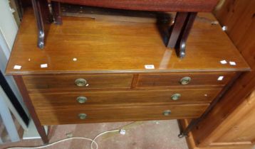 A 1.05m Edwardian mahogany and strung dressing chest with swing mirror, two short and three long