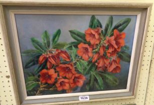 W.M. Truscott: a framed oil on canvas still life floral study entitled 'The Cornish Red' - signed