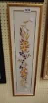 A gilt framed narrow embroidery panel floral study