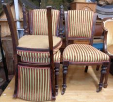 Three matching Victorian mahogany framed panel back dining chairs with red and green striped