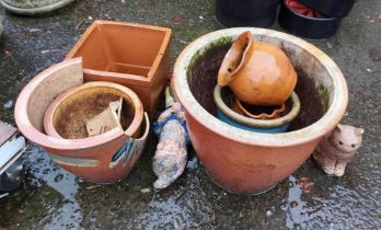 A quantity of terracotta and other garden pots - sold with a small gnome and a cat figurine