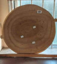 A large carved wood bowl