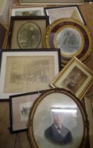 A box containing a selection of assorted framed prints including monochrome photographs, etc.