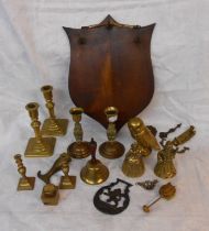 A box containing a quantity of brassware and other collectable items including candlesticks,