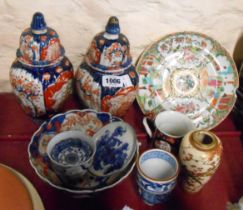 A quantity of Chinese and Japanese ceramics including pair of Imari lidded jars, etc. - various