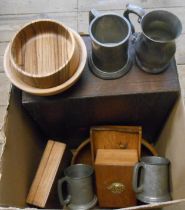 A box containing a quantity of pewter mugs and wooden boxes