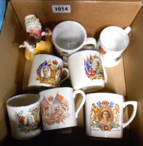 A box containing a quantity of assorted ceramics including Katshutte figurine, commemorative mugs,