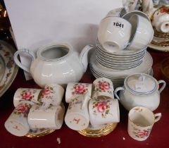 Nine Royal Crown Derby bone china coffee cans and saucers decorated in the Posies pattern - sold