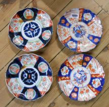 Four Japanese Imari plates with typical decoration