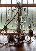 A modern five branch electrolier of wirework form with glass lustre drops
