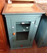 A pair of 56cm blue painted pine wall hanging cupboards, both with shelves enclosed by a single